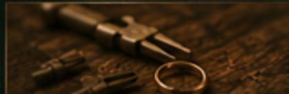Jewelry repair tools with a ring on a workbench